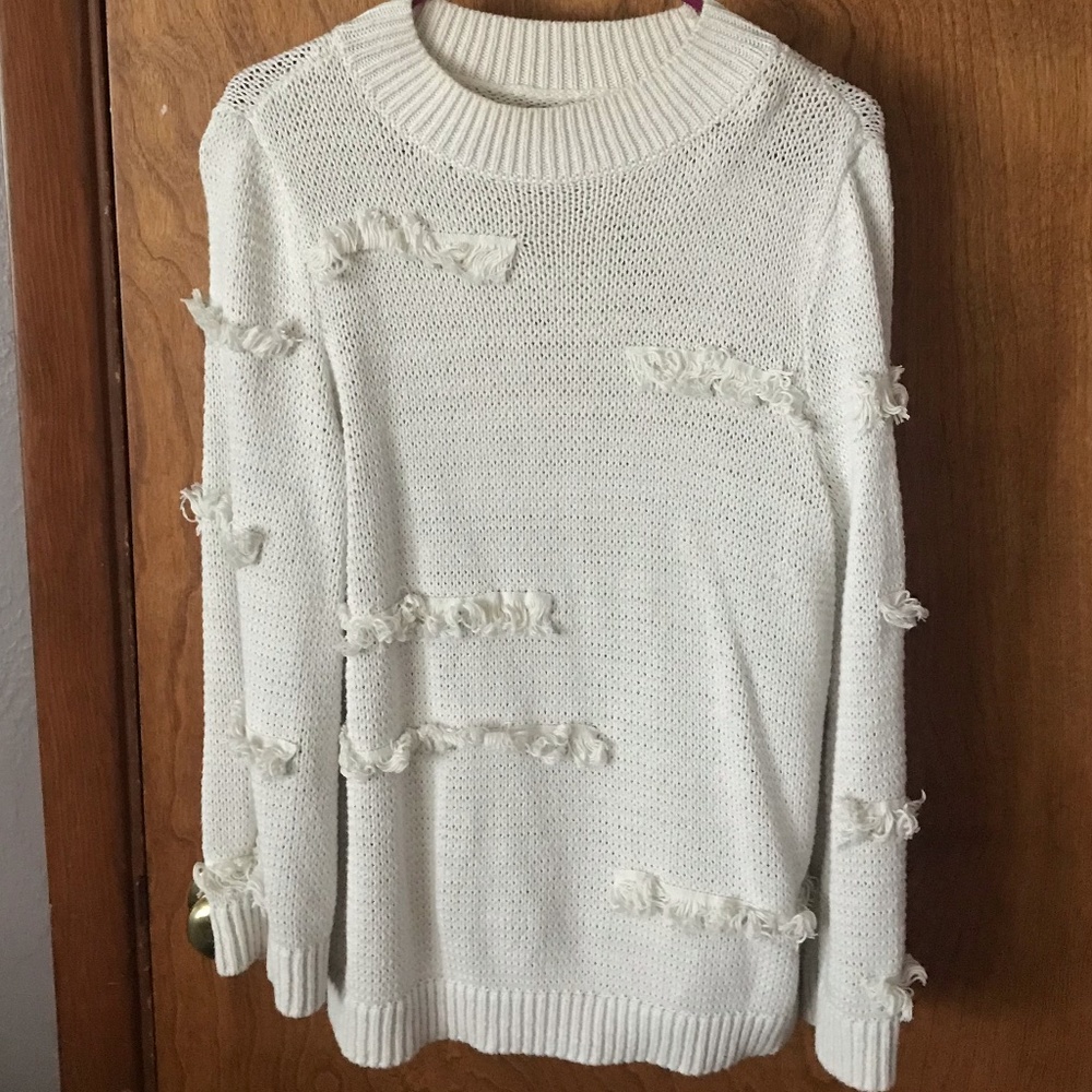 Women's large cream eyelash sweater.